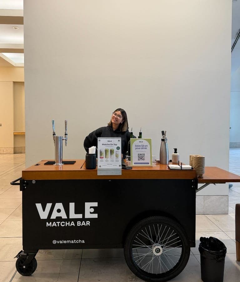 Vale Matcha Bar cart with a barista preparing drinks inside 1101 Madison St in First Hill, Seattle