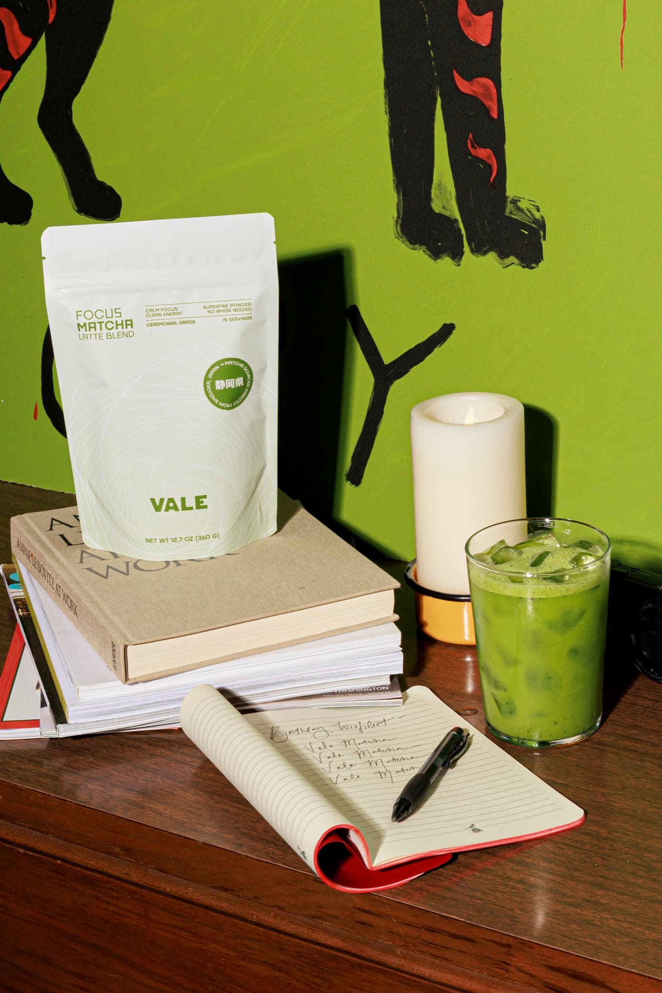 Focus Matcha on a desk with notebook and iced matcha latte